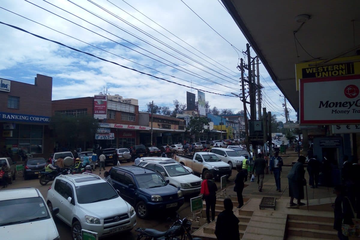 Street scene in Eldoret central business district showing KVDA Plaza in the background